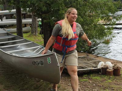 Gabriella Dalton ready to launch a canoe