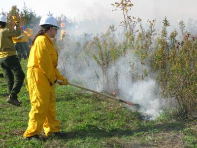 Student putting out fire