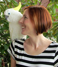 Christin Dahlin with a parrot