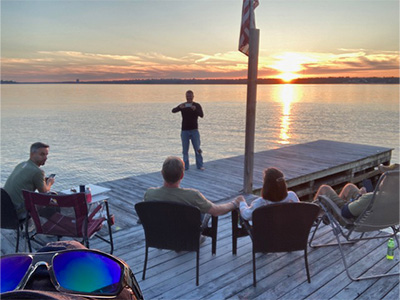 Scott with his friends at sunset