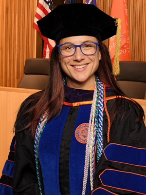 Headshot of Kristine Bialy-Viau in graduation regalia