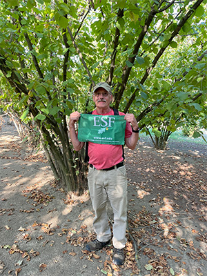 Lewis Cutler holding ESF flag
