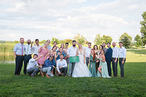 Mark Bailey and Erin Reidy at their wedding with ESF flags